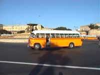 A Maltese bus making a hasty exit from Valletta.